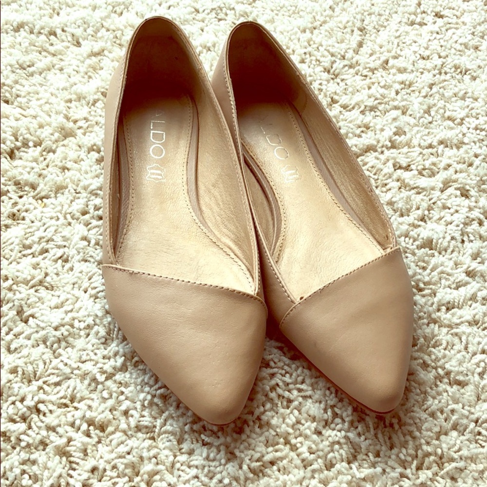 Used Aldo bone color flats.
